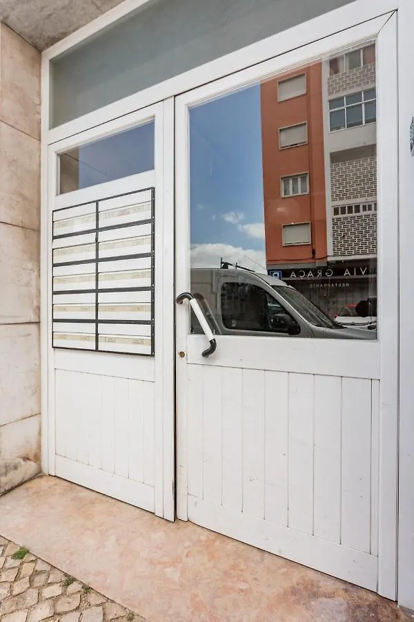 Stroll To Coffee Shops Near A Renovated Hillside Apartment In Graca Lisboa
